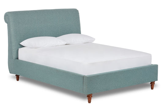 Merlin Upholstered bed with low foot end, tapered legs