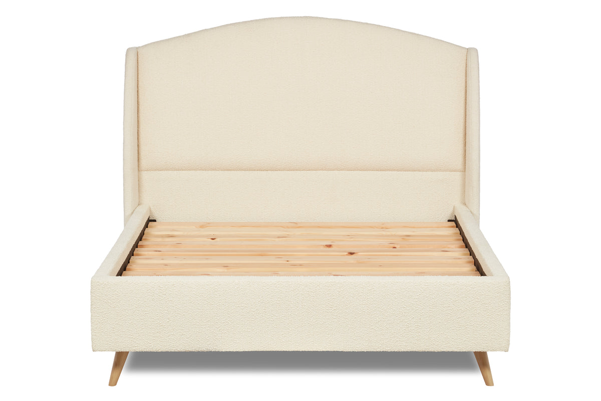 Bronte Modern upholstered bed with curved headboard