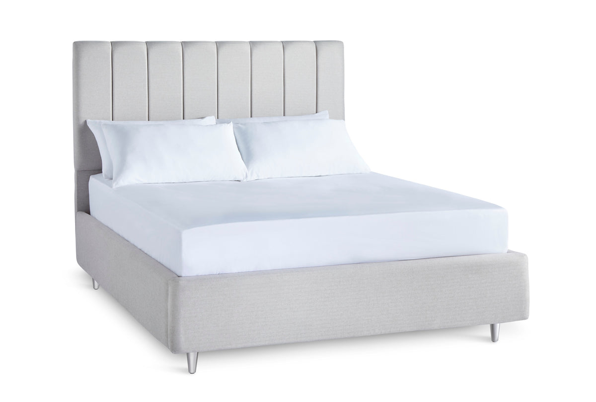 Shelley Upholstered bed with fluted headboard