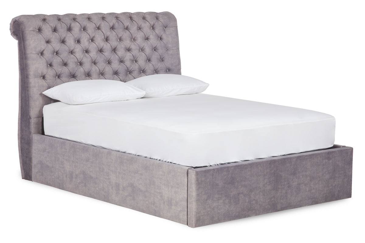 Boudica Upholstered ottoman bed with roll top headboard