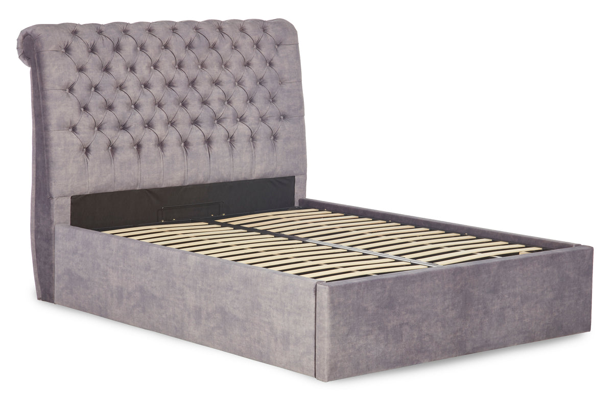 Boudica Upholstered ottoman bed with roll top headboard