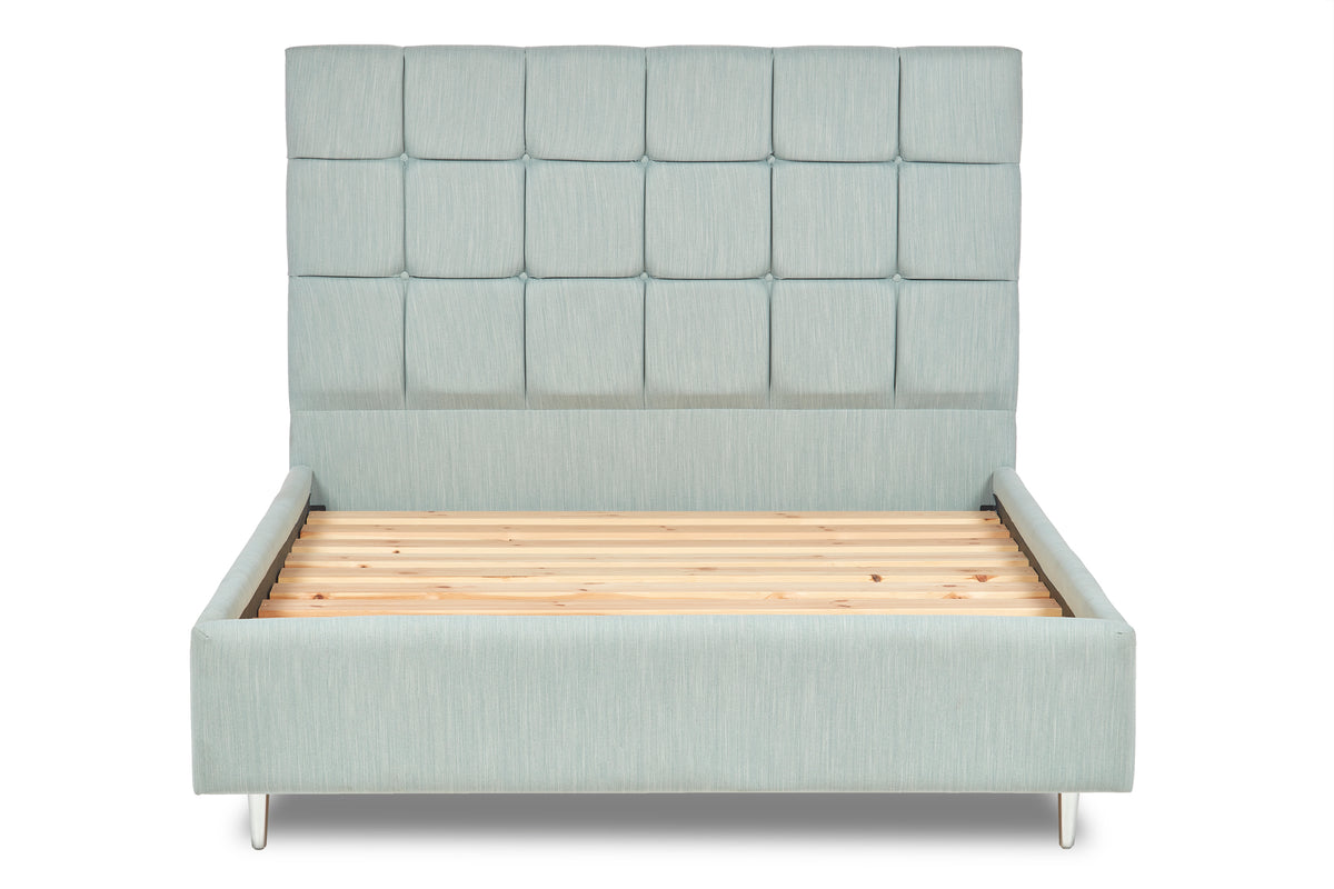 Hepworth Upholstered bed with fluted headboard and legs