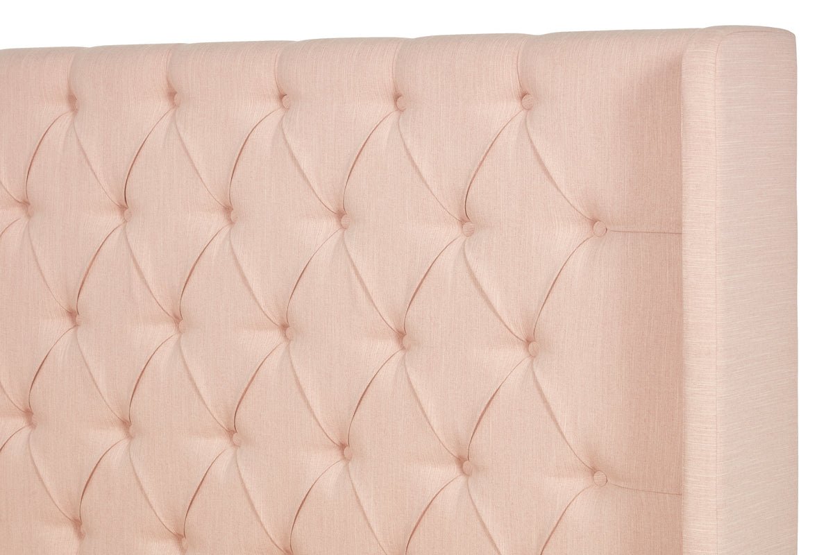 Jones Upholstered bed with Chesterfield-style winged headboard
