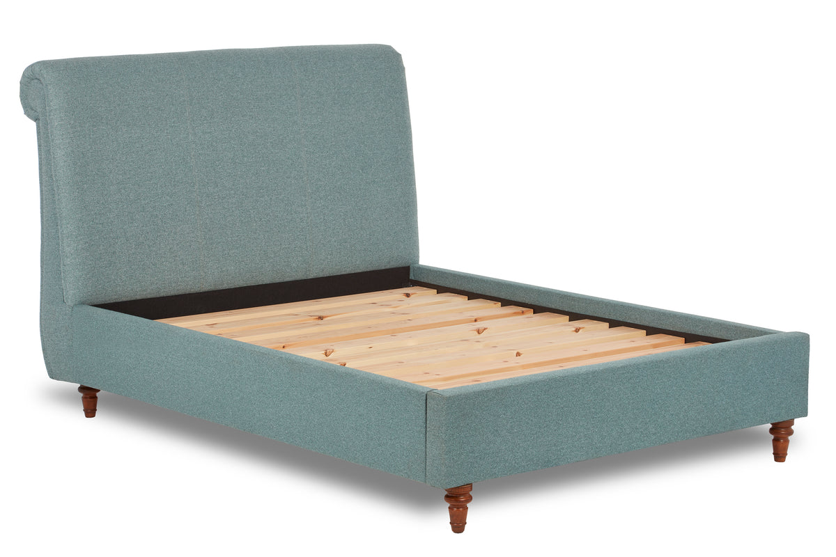Merlin Upholstered bed with low foot end, tapered legs