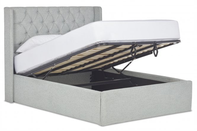 Jones Upholstered ottoman bed with winged headboard